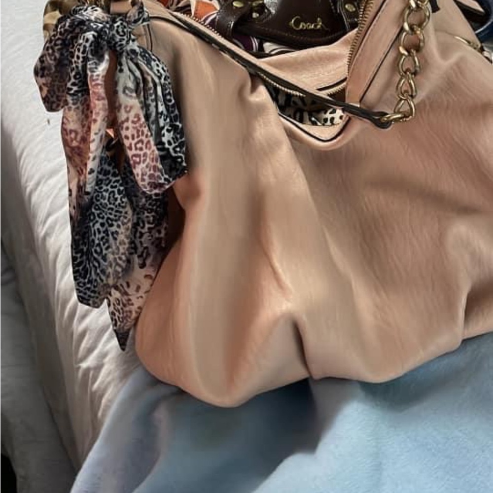 Jessica Simpson pale pink purse with scarf on side. Very good condition.